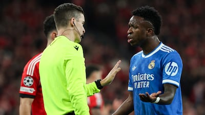 Real Madrid's Vinicius Junior speaks to the referee during their Champions League win at Benfica. EPA