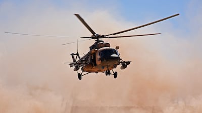 An Iraqi military helicopter landing near the Al Qaim crossing in November 2018 as US-backed forces battled ISIS across the border in Syria. AFP