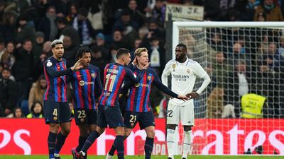 Barcelona players celebrate at the final whistle. Getty Images