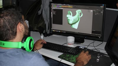 A character designer grooms the beard of one of the characters. Hair is the most difficult feature to animate – Bilal’s alone took 960 hours. Courtesy Barajoun