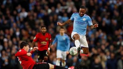 Manchester City's Raheem Sterling takes on Manchester United's Victor Lindelof. Reuters