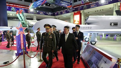 North Korean leader Kim Jong-un and Russia's Defence Minister Sergei Shoigu visit an arms exhibition on the 70th anniversary of the Korean War armistice. Reuters