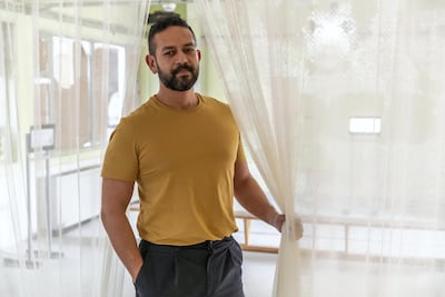 Mohamed Elshahed with his installation at the Sharjah Architecture Triennial. Antonie Robertson / The National