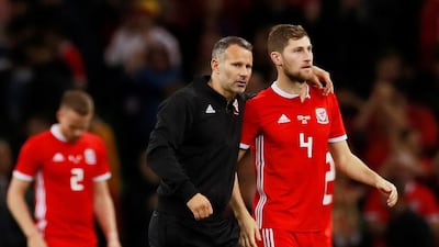 Ryan Giggs and Ben Davies after the match between Wales vs Spain. Reuters