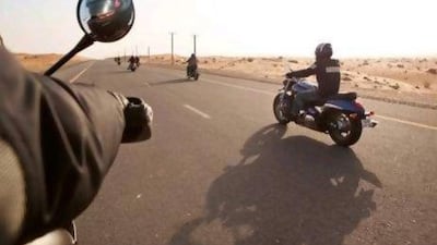 Bikers brave the heat of summer early on Fridays in search of stunning views, open roads and the perfect egg roll. Antonie Robertson / The National