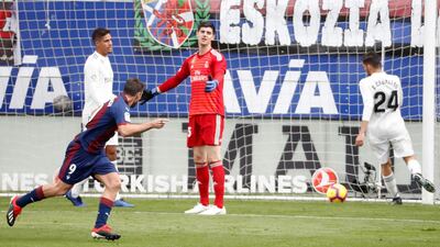 Real Madrid goalkeeper Thibaut Courtois looks dejected after Sergi Enrich gave Eibar a 3-0 lead at Ipurua Stadium. EPA