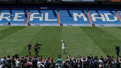 Rodrygo poses for photos during his Real Madrid unveiling. AP Photo