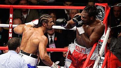 The exciting David Haye, left, took just over eight minutes to dispose of a rather boring Audley Harrison in their WBA Heavyweight championship contest in Manchester on Saturday night.