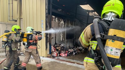 A fire in two warehouses in Dubai's Al Qouz industrial area 3 was brought under control. Photo: Dubai Civil Defence