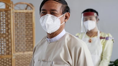 Myanmar President Win Myint greets members of the media after casting his ballot in Naypyitaw. EPA