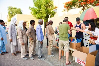 More than 800 people are being fed iftar packs each night by this community of Dubai neighbours. Alex Jeffries Photography Group