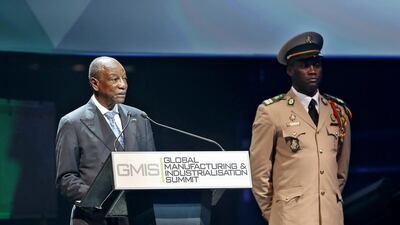 Above, Alpha Condé, president of the Guinea, who signed a deal with Unido to promote industrial research in the west African republic, speaking during the industrialisation summit in Al Ain. Pawan Singh / The National