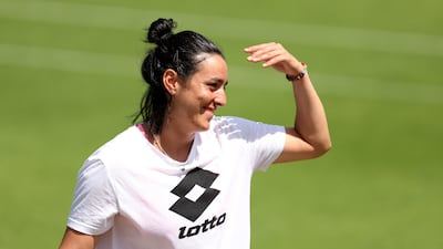 Ons Jabeur smiles during a training session. The Tunisian is the first Arab to reach a Grand Slam singles final. Getty Images