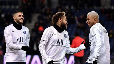 Mauro Icardi, left, is happy to compete with the likes of Neymar, centre, and Kylian Mbappe, right for a starting berth at PSG after making his loan from Inter Milan permanent. AFP