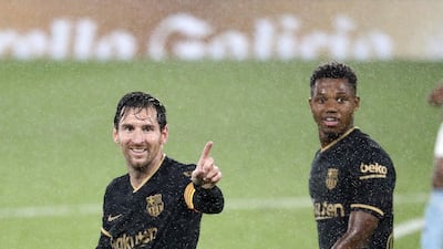 Lionel Messi and Ansu Fati. EPA