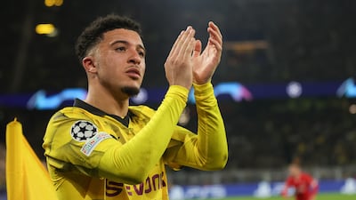 Jadon Sancho applauds the fans after leaving the pitch due to an injury. EPA