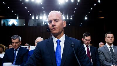 Dennis Muilenburg, centre, pictured in October, appearing before the US Senate Committee on Commerce, Science and Transportation hearing on 'Aviation Safety and the Future of Boeing's 737 MAX' in Washington. EPA