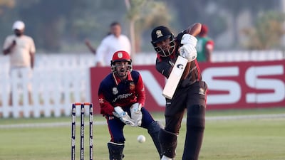 Darius D'Silva of UAE plays a shot.