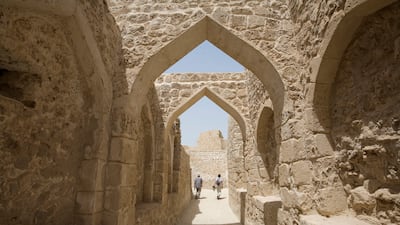 Tourists visit Qal'at al-Bahrain, an archaeological site near Manama. Jaime Puebla / The National