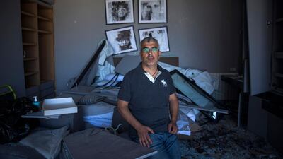 Karim Corbani, 45, poses for a portrait inside his bedroom in Beirut. Getty Images