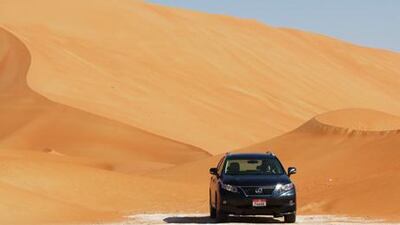The high, orange sand dunes south of Al Ain contrast sharply with the restored Segia Fort just outside the city.