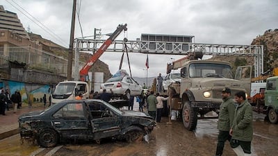 Damaged vehicles are seen after a flash flooding In Shiraz. Reuters