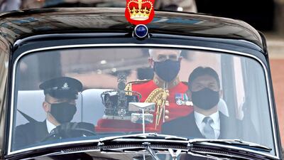 The Imperial State Crown is driven from Buckingham Palace to the Houses of Parliament for the State Opening of Parliament. AFP