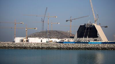 The skeleton of the Rain of Light mockup sits next to Louvre Abu Dhabi in September 2014. Silvia Razgova / The National