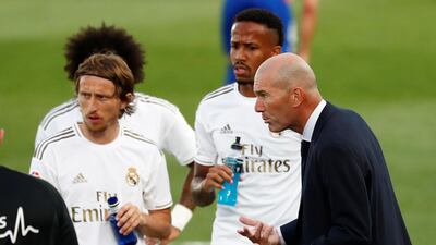 Luka Modric with coach Zinedine Zidane during drinks break. Reuters