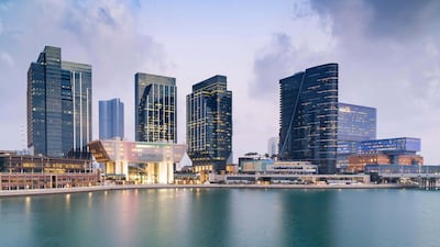 A view of Au Dhabi Global Market on Al Maryah Island in Abu Dhabi. Mubadala is taking a minority stake in could computing and artificial intelligence firm Group 42. Alamy