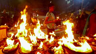 Hindu devotees light Diyas, oil lamps made from clay or mud, to mark the auspicious last Monday of the Kartika month, at a temple in Bangalore, India. EPA