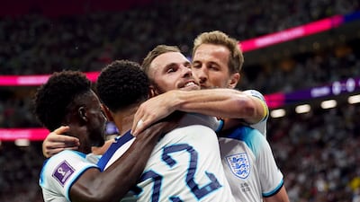 England's Jordan Henderson celebrates scoring the opening goal with Jude Bellingham, Harry Kane and Bukayo Saka. PA