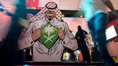 Visitors enter the Saudi Comic Con, the first event of its kind to be held in Jiddah, Saudi Arabia. Saudi Arabia announced on Monday Dec. 11 that movie theaters will open in the kingdom next year, for the first time in more than 35 years. AP