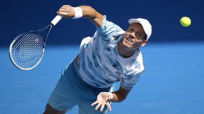 Tomas Berdych serves against Bernard Tomic during his fourth round victory at the Australian Open on Sunday in Melbourne. Made Nagi / EPA / January 25, 2015