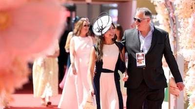 Guests arrive at the Dubai World Cup. Chris Whiteoak / The National