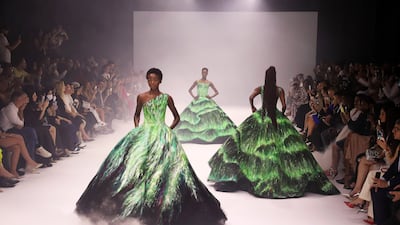 Michael Cinco ended his show with three gowns inspired by the Northern Lights.