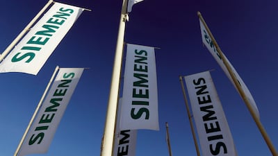 Siemens on Thursday signed a 10-year lease agreement to set up its Dubai operations at District 2020. AP