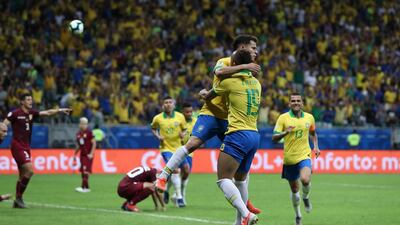 Philippe Coutinho celebrates his goal with teammate Everton before it was later disallowed by the referee. AP Photo