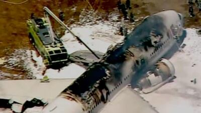 This image courtesy of CBS affiliate KPIX, shows firefighthers fighting a fire on an Asiana Airlines Boeing 777 after it crash landed on the runway at San Francisco International Airport: AFP Photo / CBS/KPIX