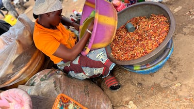 Spices, fruit, vegetables and clothes are sold from stalls in Tombo market. Nick Webster / The National