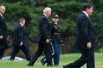 US President Joe Biden walks to board Marine One as he leaves Fort Lesley J McNair in Washington. AP Photo