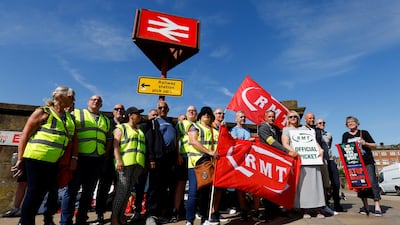 Rail workers picket outside Preston station in northern England. Reuters