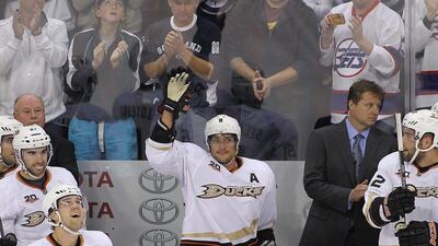 Teemu Selanne receives an ovation from the Winnipeg crowd, where he spent four seasons as a Jet. Marianne Helm / Getty Images/ AFP