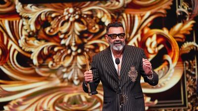 Bobby Deol with his IIFA award for Best Performance in a Negative Role for his role in Animal