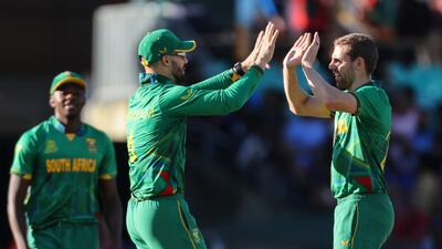 South Africa's Anrich Nortje celebrates a wicket with Aiden Markram. AFP