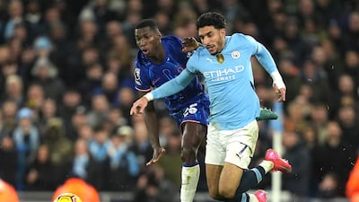 Manchester City's Omar Marmoush, right, and Chelsea's Moises Caicedo battle for the ball. PA