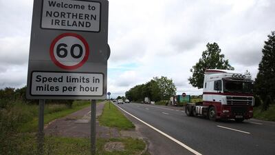 Traffic crossing the border between the Republic of Ireland and Northern Ireland in the village of Bridgend, County Donegal, Ireland. Brian Lawless/ AP