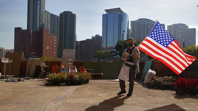 A protester holds an American flag inside the Hong Kong Polytechnic University (PolyU). EPA