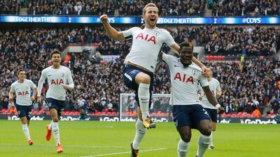 Harry Kane, centre, is once again among the goals as Tottenham thrash Liverpool. Frank Augstein / AP Photo