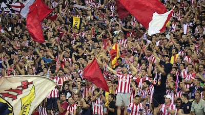 Atletico Madrid's fans celebrate after winning the Spanish Super Cup on Friday night. Gerard Julien / AFP